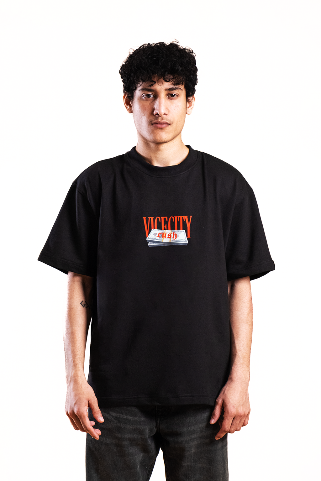 Person wearing a black t-shirt with a logo on a white background