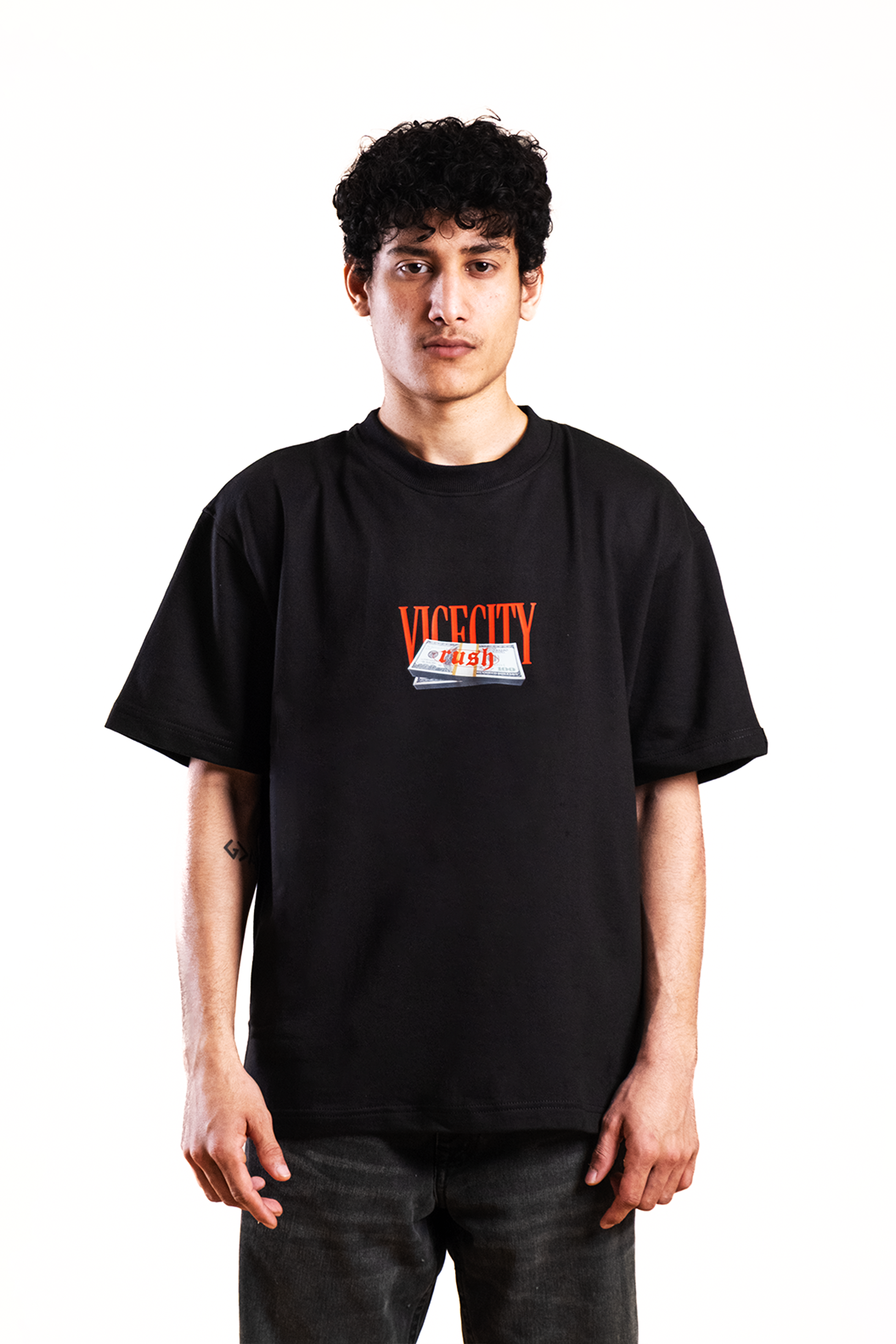 Person wearing a black t-shirt with a logo on a white background